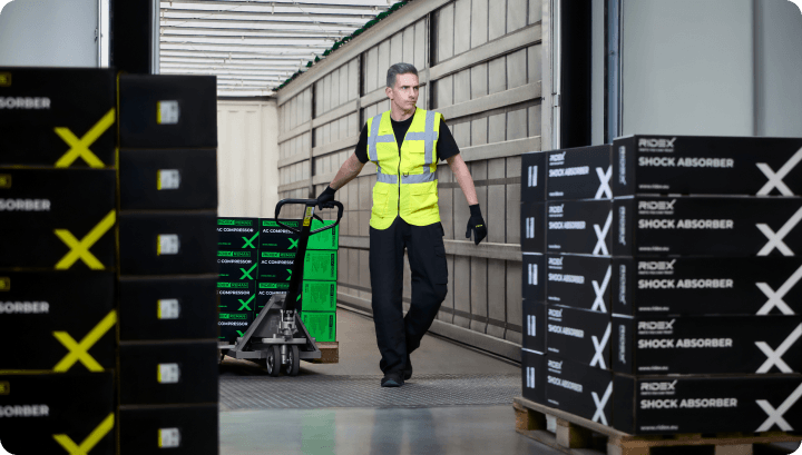 Warehouse worker moving boxes